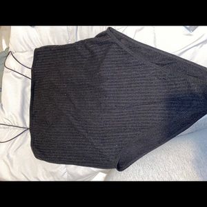 Black Ribbed Bodysuit. This has never been worn. It’s from Forever 21 a size M